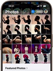 Photos app open and showing artistic photos on an iPhone 16 Pro in Desert Titanium