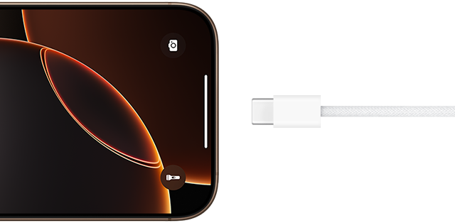 USB-C cable plugging in to an iPhone 16 Pro in Desert Titanium